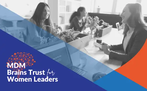 Image of two corporate women talking, with text overlaid: MDM Brains Trust for Women Leaders